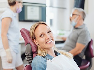 Woman smiling in the dental chair